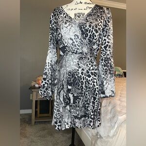 Express-  Beautiful Black and White/ Grey Animal Print Dress size Medium in EUC